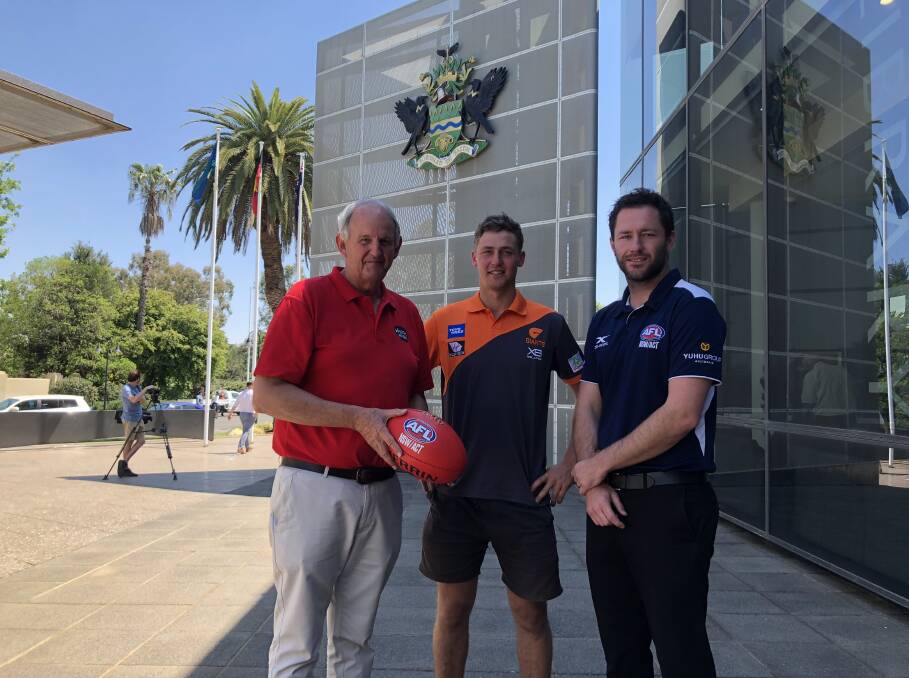 PARTNERS: Wagga mayor Greg Conkey OAM, GWS footballer Harry Perryman and AFL Southern NSW game development manager Marc Geppert.