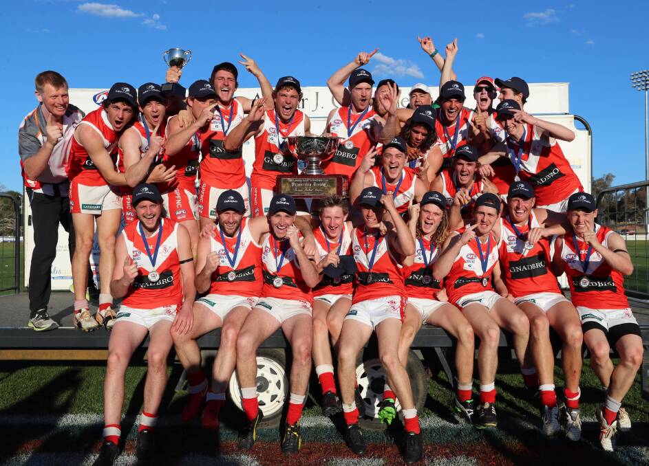 BACK ON TOP: Collingullie-Glenfield Park players celebrate their premiership at Narrandera Sportsground on Saturday. Picture: Les Smith
