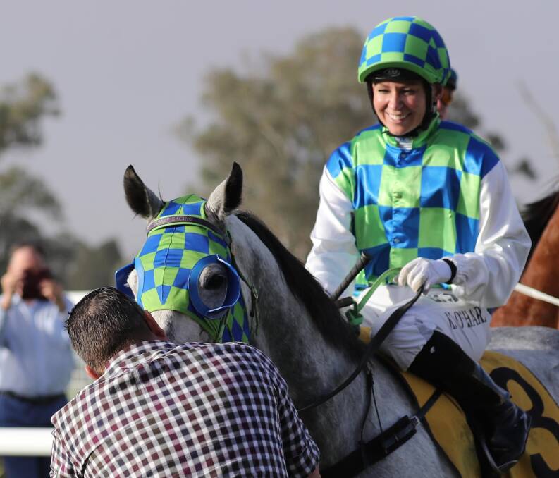 WINNING SMILE: Kathy O'Hara celebrates her Wagga Town Plate win on Coolring in 2018. Picture: Les Smith