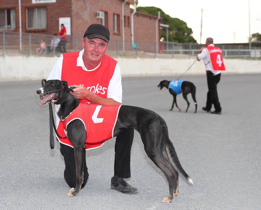 HOPEFUL: Holbrook trainer Dirk Bosman with Spicy Blast at Wagga last year. Bosman will be represented by Manticore and Dyna Elias on Friday night.