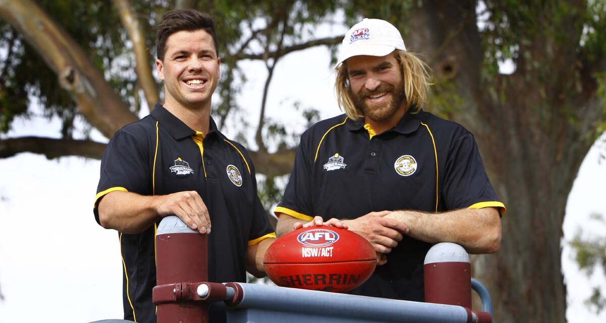 ALL SMILES: Nathan Dowdle is welcomed aboard by Wagga Tigers captain-coach Shaun Campbell at pre-season training on Thursday. Picture: Les Smith
