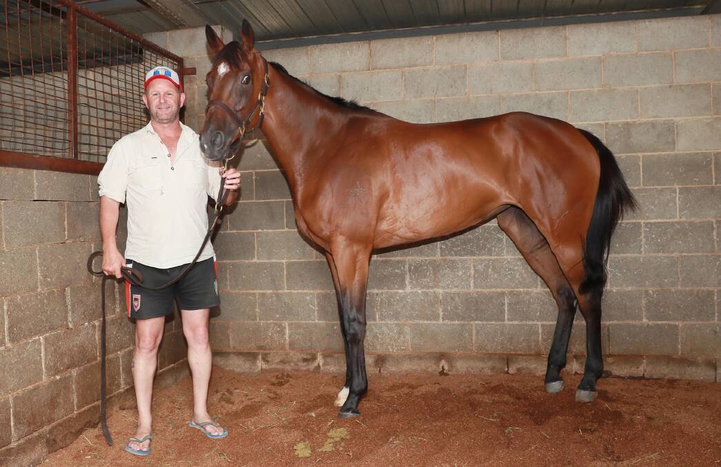 Chris Heywood with Coves at his Wagga stables on Tuesday. Picture: Les Smith