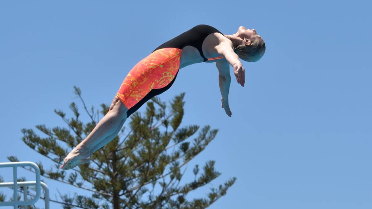 STILL GOT IT: Former Wagga diver Kate Henderson competes during the Pan Pacific Masters Games at the Gold Coast.
