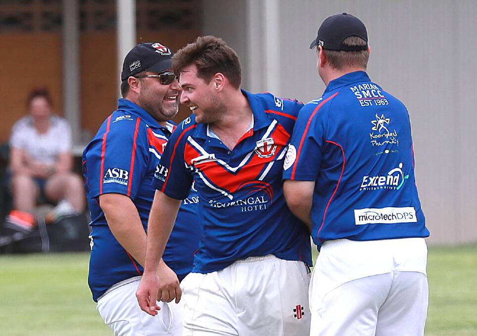 HAPPY DAYS: Saint Michaels bowler Kyle Buckley celebrates the wicket of Andrew Dutton with his teammates at Harris Park on Saturday.