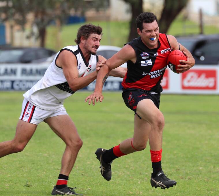 Cayden Winter looks to lay a tackle on Marrar's Brad Moye earlier in the season. Picture: Les Smith