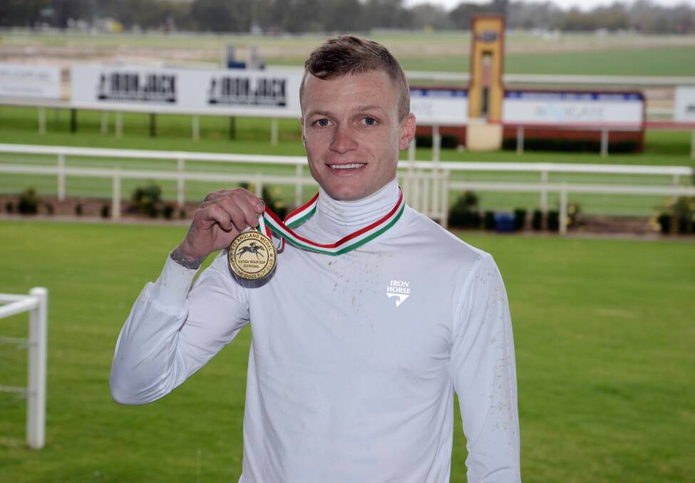 SPECIAL HONOUR: Blaike McDougall shows off his second Tye Angland Medal that he won on Friday for the leading jockey over the two big days of the Wagga Gold Cup carnival. Picture: Kylie Shaw - Trackpix