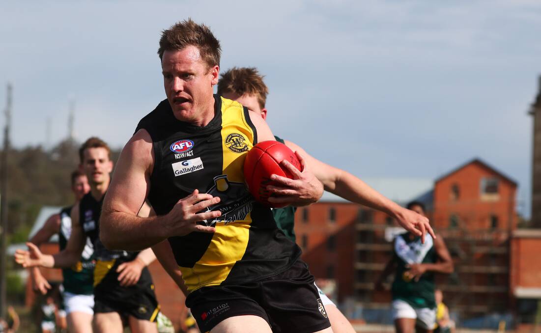 BACK AT HOME: Experienced footballer Josh Gaynor in action for Wagga Tigers in the preliminary final win over Coolamon last Sunday. Picture: Emma Hillier