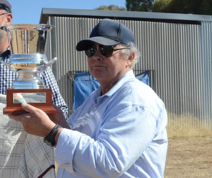 The late Phil Sweeney with this year's Carrathool Cup he won with Bezazzalled. Picture by Allan Wilson