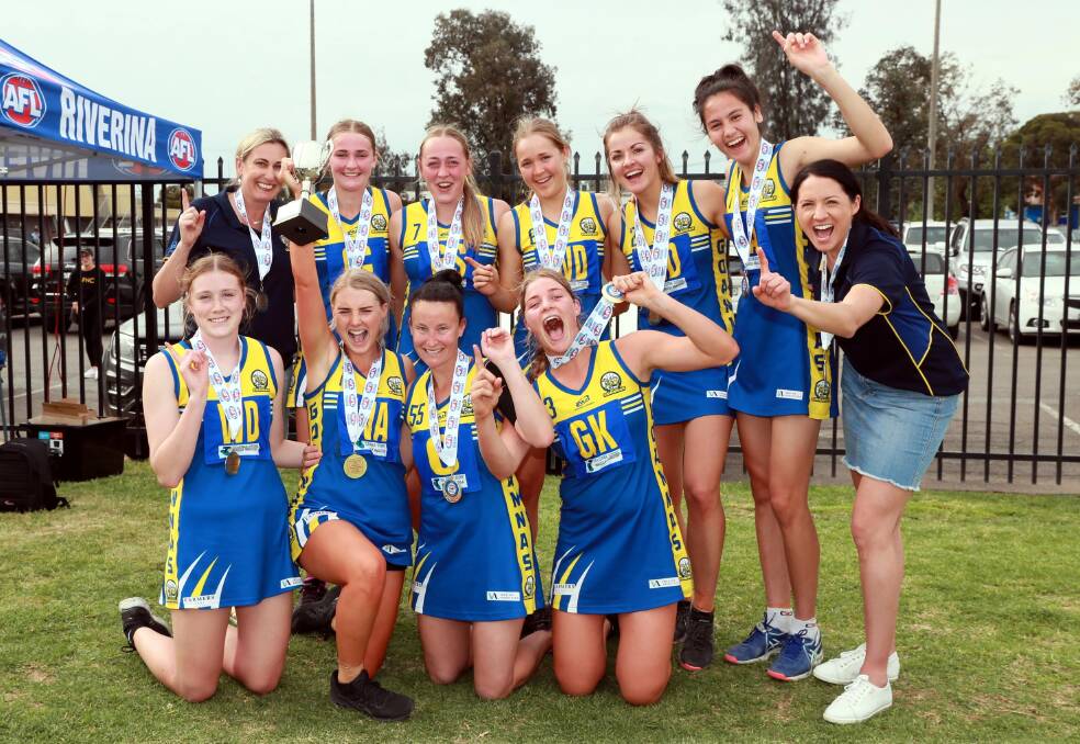 CHAMPIONS: Mangoplah-Cookardinia United-Eastlakes celebrate their grand final win at Robertson Oval on Saturday. Picture: Les Smith