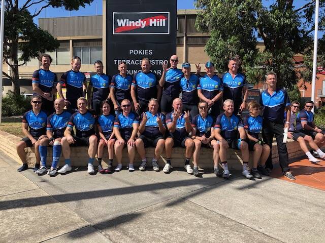 WE MADE IT: Pedalcure4MND riders celebrate their arrival at Windy Hill on Sunday after riding from Ungarie to Melbourne.