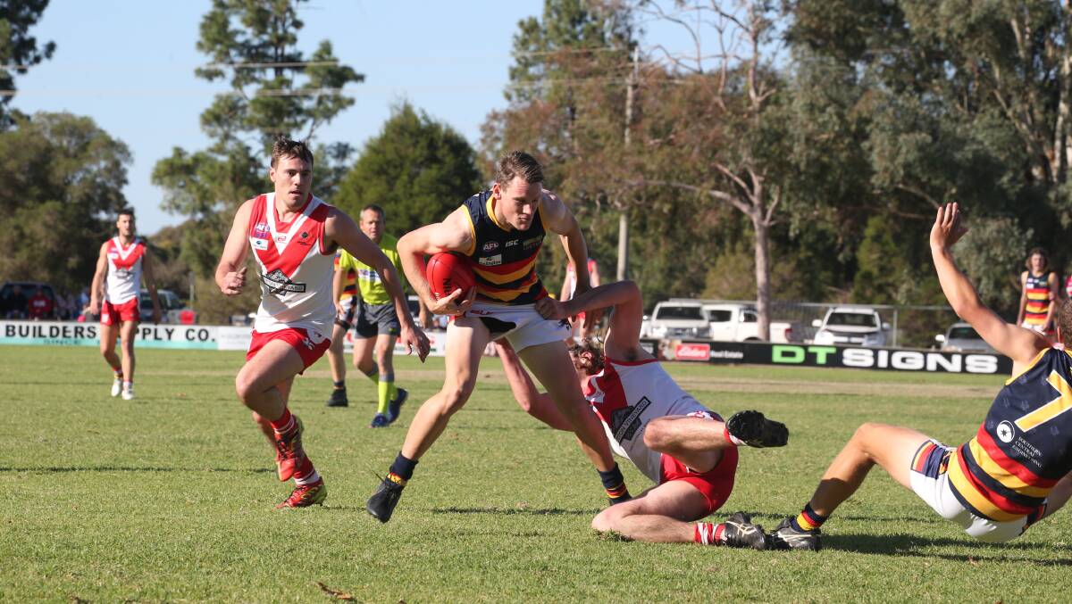 UNDER THE PUMP: Tim Sidebottom in action for Leeton-Whitton against Griffith in the Riverina League game at Exies Oval on Saturday. Picture: Anthony Stipo