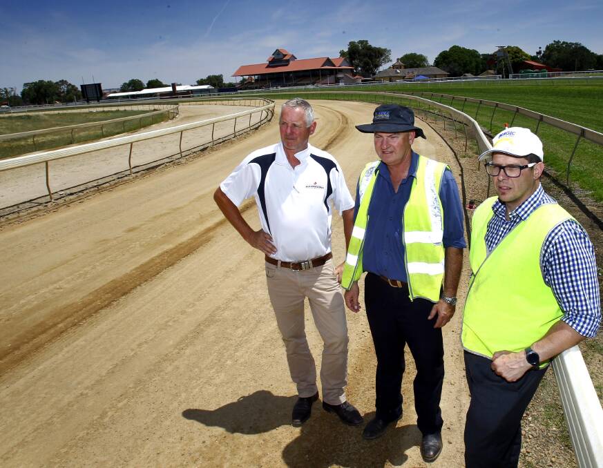 BIG JOB: Murrumbidgee Turf Club director, chairman of works and tracks, Geoff Harrison, Ladex Constructions managing director Richard Pottie and Racing NSW's Callum Brown inspect the works on Wednesday. Picture: Les Smith