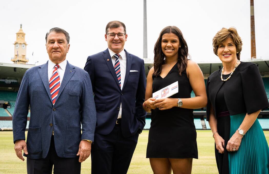 SPECIAL MOMENT: Jada Whyman is presented her scholarship by Sydney Roosters chairman Nick Politis, chief executive Joe Kelly and Minerva Network co-founder and chairwoman Christine McLoughlin. Picture: Minerva Network