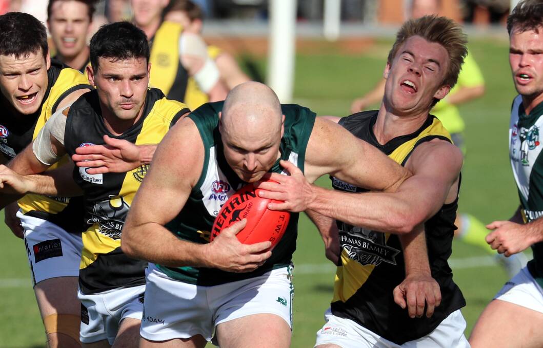 LAST TIME THEY MET: Connor Neyland battles it out for Coolamon against Dylan Morton from Wagga Tigers.