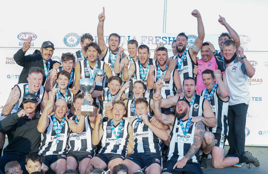 The Rock-Yerong Creek celebrate their Farrer League premiership victory at Robertson Oval on Saturday. Picture by Les Smith