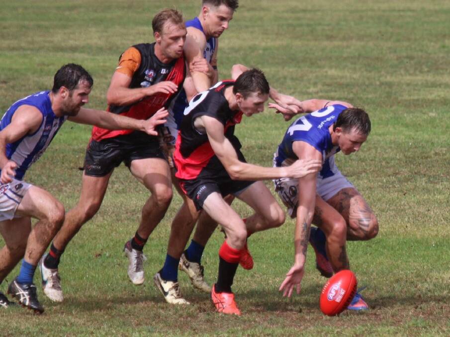 New Temora ruck Brayden Burgess looks to knock the ball along in the opening round clash against Marrar at Langtry Oval on Saturday. Picture by Cathie Fox