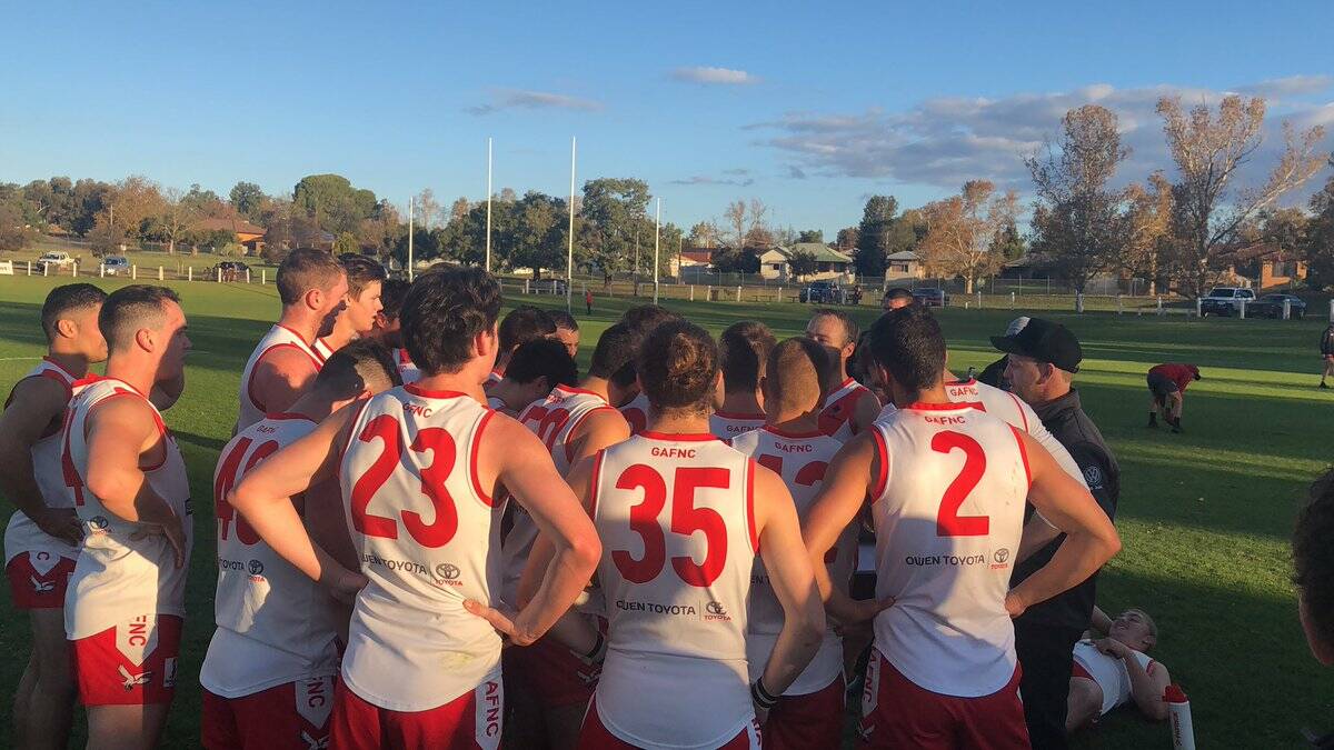GET BETTER: Griffith coach Will Griggs talks to his players at a break in the win over Narrandera at Narrandera Sportsground on Saturday. Picture: Liam Warren