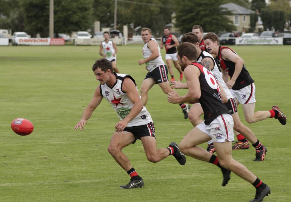 UNDER THE PUMP: North Wagga coach Cayden Winter looks to pounce on the ball during the round two loss to Marrar. Winter concedes the Saints are under pressure but is looking forward to taking on East Wagga-Kooringal on Saturday. Picture: Madeline Begley