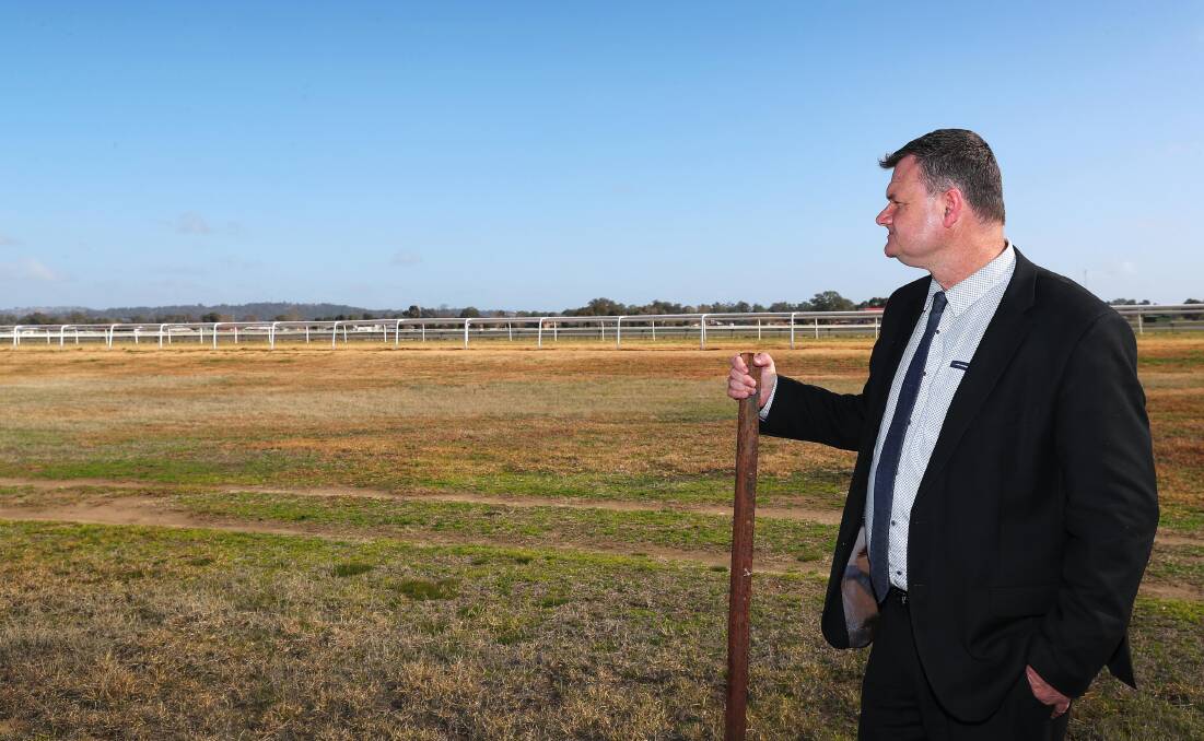 Former MTC chief executive Scott Sanbrook looks over the land earmarked for stables.