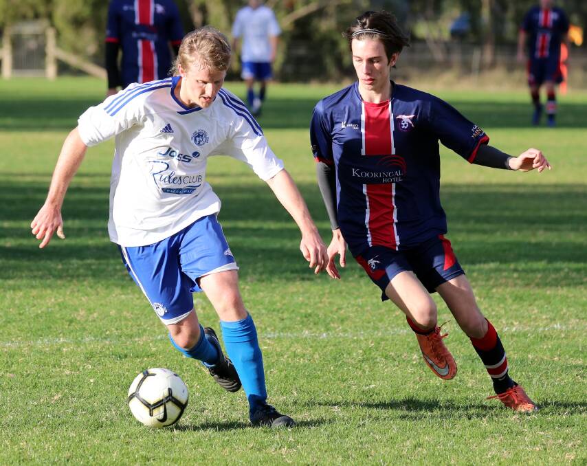 RIVALS: Tolland's Matthew Kleine and Henwood Park's Lewis Crowley battle it out in a Pascoe Cup game last season. Picture: Les Smith