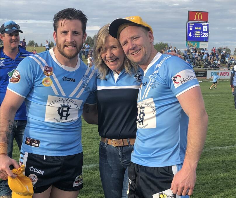 FAMILY AFFAIR: Lachlan (left) and Dean Bristow celebrate Tumut's grand final victory over Southcity with mum Sue in September. Picture: Courtney Rees