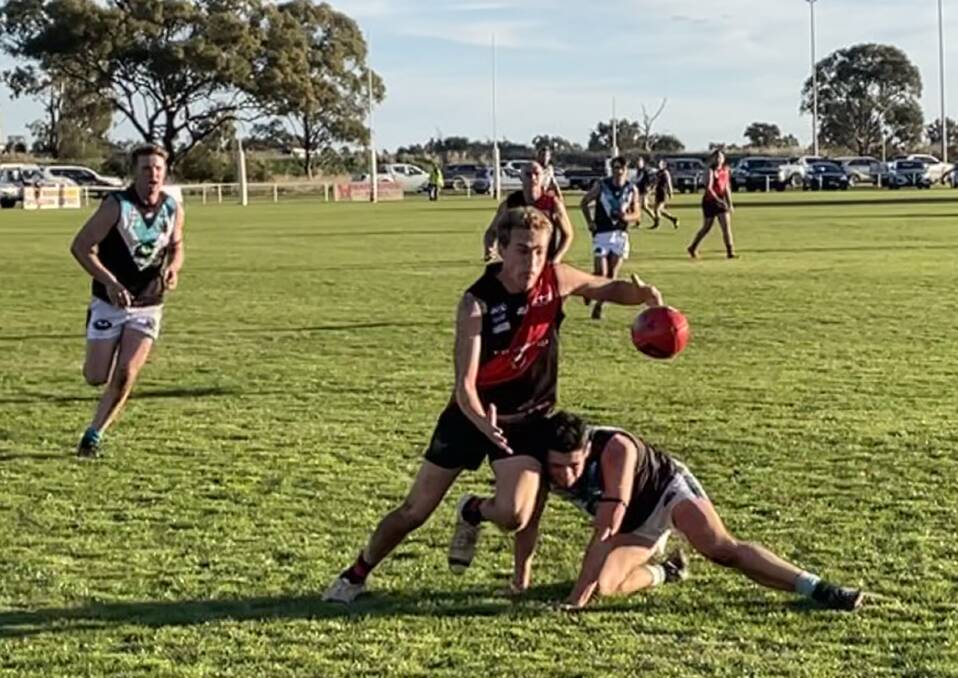 ON FIRE: Marrar's Jack Reynolds pounces on the ball during the win over Northern Jets at Langtry Oval on Saturday. Picture: Matt Malone