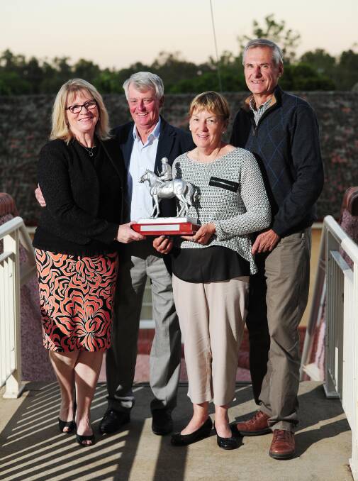 WINNERS: Connections of Challenge Accepted, Maureen Duryea, Geoff Duryea, Sandra Corcoran and Bruce Corcoran, show off their SDRA 3YO of the Year trophy at Murrumbidgee Turf Club on Friday night. Picture: Kieren L Tilly