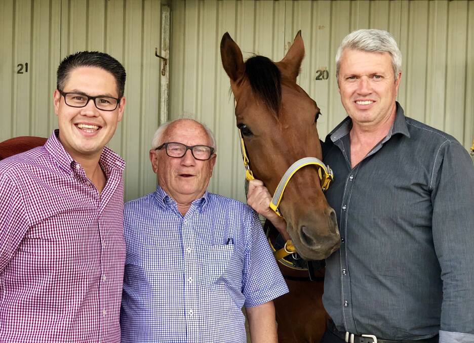 HAPPY DAYS: Wes Fang MLC, Wagga Harness Racing Club president Terry McMillan and Wagga Harness Racing Club chief executive Graeme White celebrate the grant.