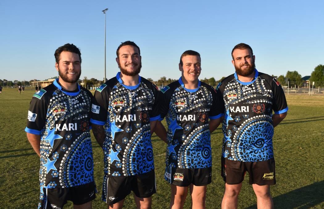 GALLANT: Dindima players Tyson and Dylan McLachlan and Makele and Clifford Morris showed off their new jumpers before heading to the Koori Knockout. Picture: Courtney Rees