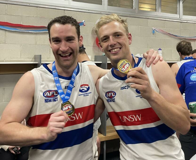 New Marrar signings Lachlan O'Callaghan and Jake Brown celebrating their AFL Sydney premiership with UNSW-Eastern Suburbs earlier this month. Picture supplied