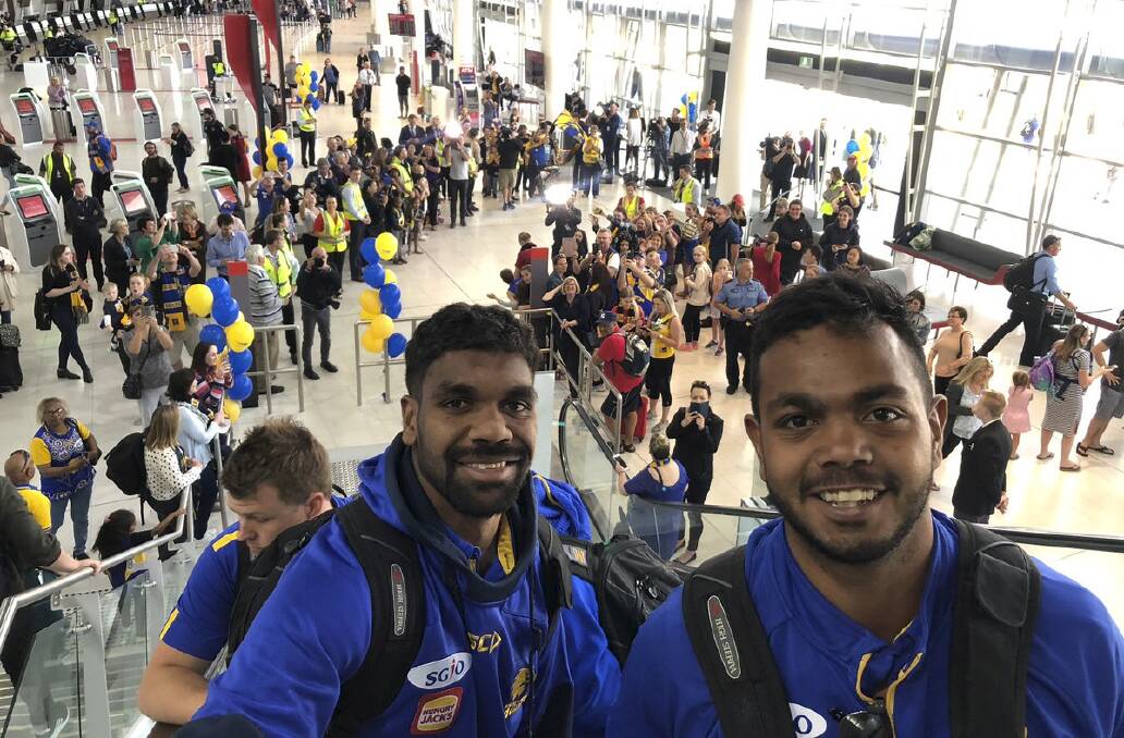 West Coast's Liam Ryan and Willie Rioli leave Perth Airport for Melbourne on Thursday.