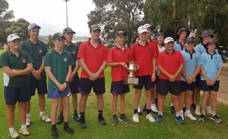 WINNERS: Kildare Catholic College's team accept the Steve Elkington Cup at Wagga Country Club on Tuesday, while TRAC and Mater Dei Catholic College filled the minor placings.