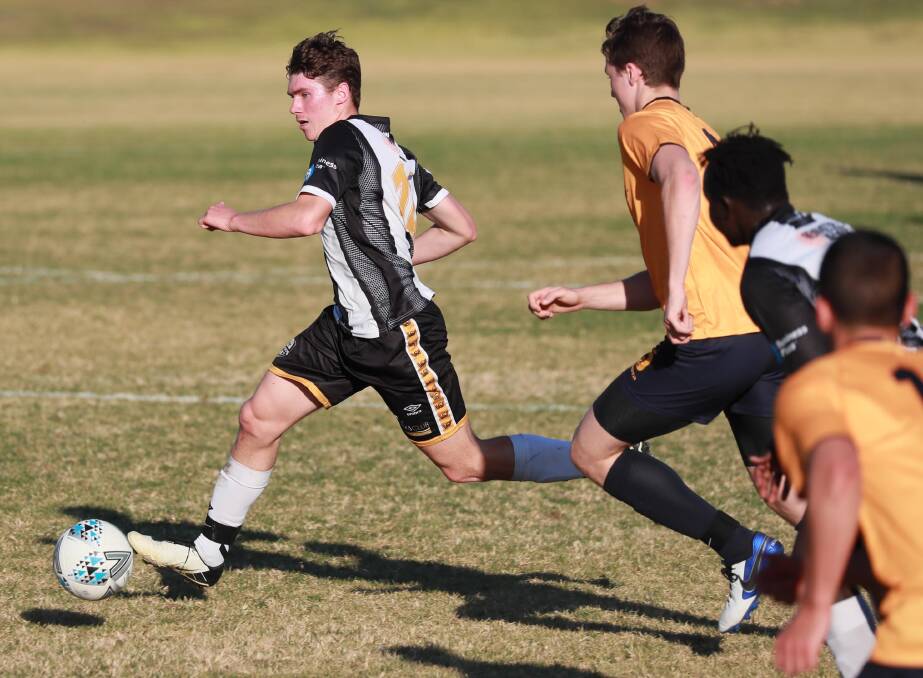 NOW THE ENEMY: Luke Stevens in actions for Wagga City Wanderers last year. Stevens will be part of the Tuggeranong United team that travels to Wagga to take on the Wanderers in round one. Picture: Les Smith