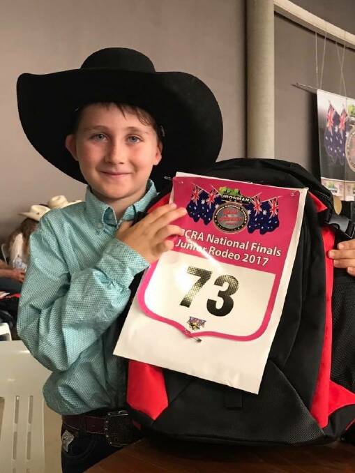 RISING STAR: Eight-year-old Chase Russell shows off his competitor number at the ABCRA National Finals in Tamworth.