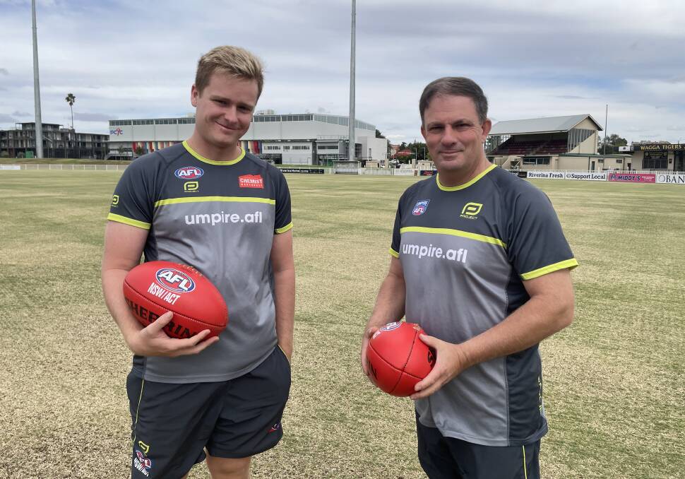 AFL NSW-ACT umpire recruitment and retention lead Tyler Hollingworth with AFL umpire coordinator ACT and regional NSW Troy Mavroudis at Robertson Oval this week. Picture by Matt Malone