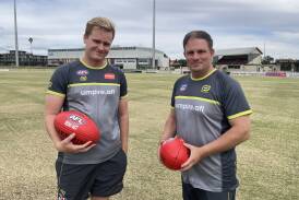 AFL NSW-ACT umpire recruitment and retention lead Tyler Hollingworth with AFL umpire coordinator ACT and regional NSW Troy Mavroudis at Robertson Oval this week. Picture by Matt Malone