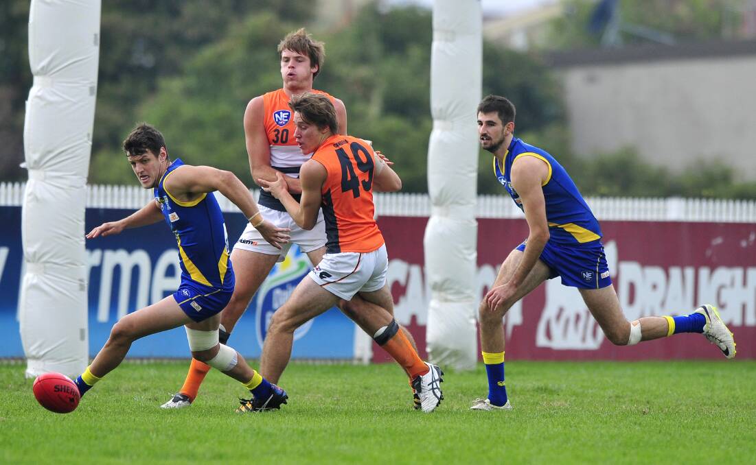 NEW START: Nick Collins (left) in action for Canberra Demons. He will make his debut for Mangoplah-Cookardinia United-Eastlakes on Saturday.