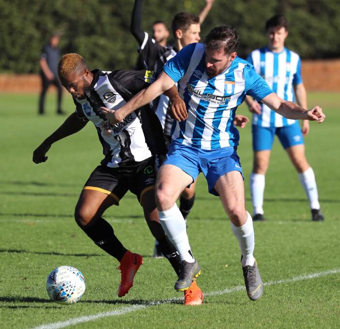 BACK AT UNITED: Prince Thompson (left) will return to Wagga United this season after a year with Wagga City Wanderers. Picture: Les Smith