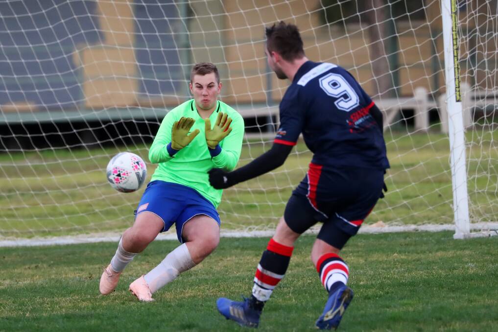 Jake Ploenges fires one past the Hanwood keeper at Rawlings Park on Sunday. Picture: Emma Hillier