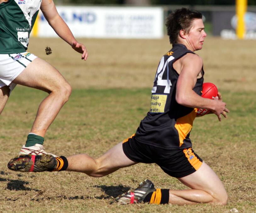 BACK ON BOARD: Sam Ryan in action for Wagga Tigers back in 2010. He will return to the club next season.