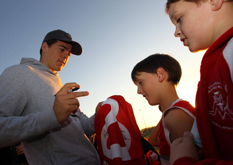 Matt Kennedy signs autographs at Collingullie training back in 2017.