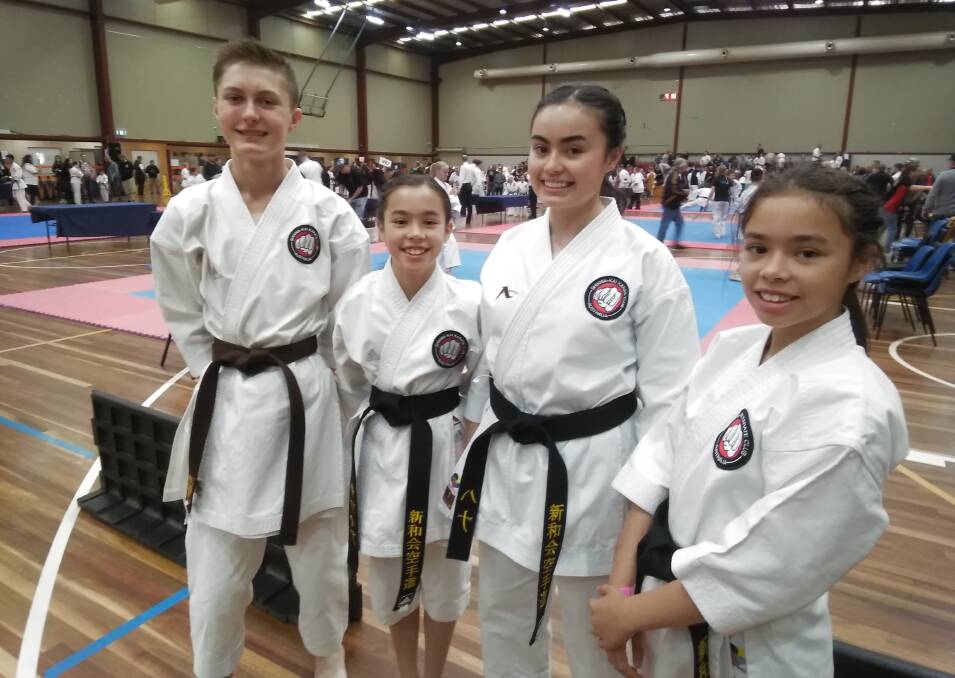 TOP PERFORMERS: Bradley McCrea, Safiah Sawal, Hana Sawal and Jamilah Sawal at the NAS martial arts national championships in Melbourne.