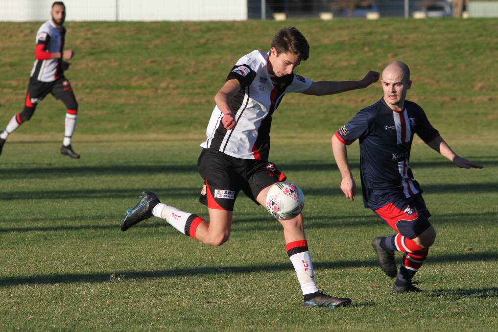Leeton United's Nathan Ciccia takes on the Henwood Park defence. Picture: Talia Pattison