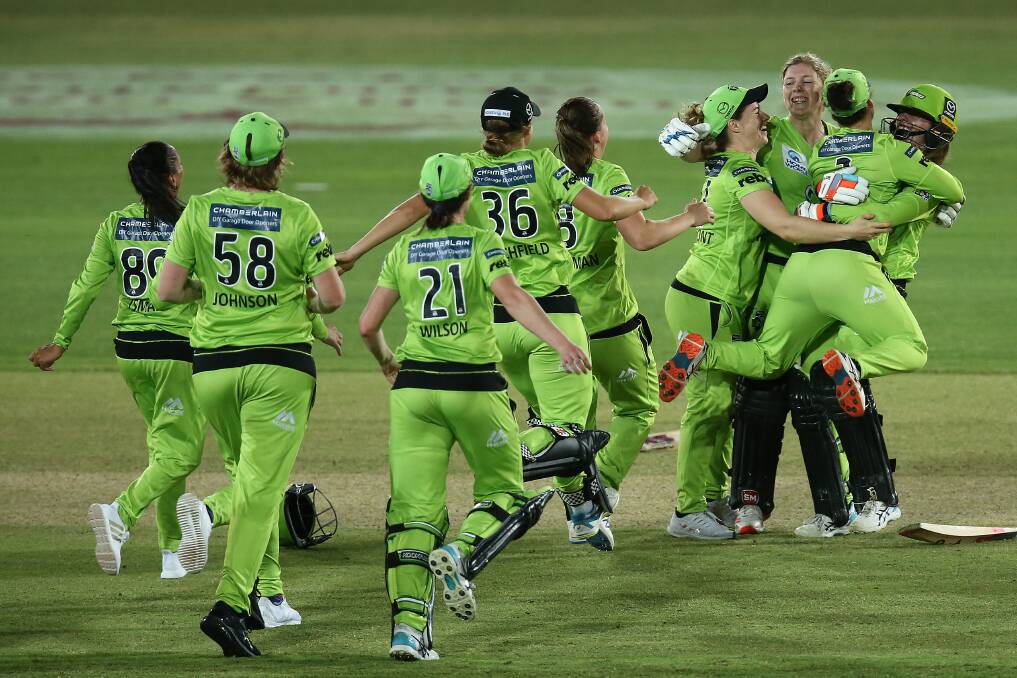 PARTY TIME: Sydney Thunder players celebrate after the winning runs were hit to clinch the team the WBBL title. Picture: Sydney Thunder
