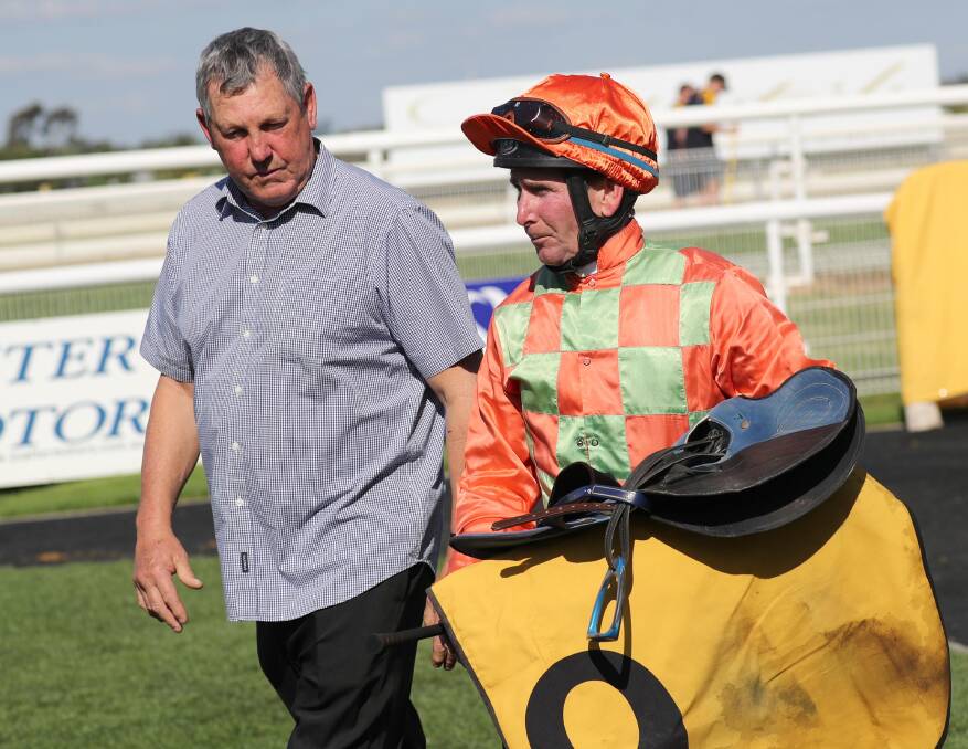 Wagga trainer Gary Colvin with Bryan Murphy in Nelson Wu's colours.