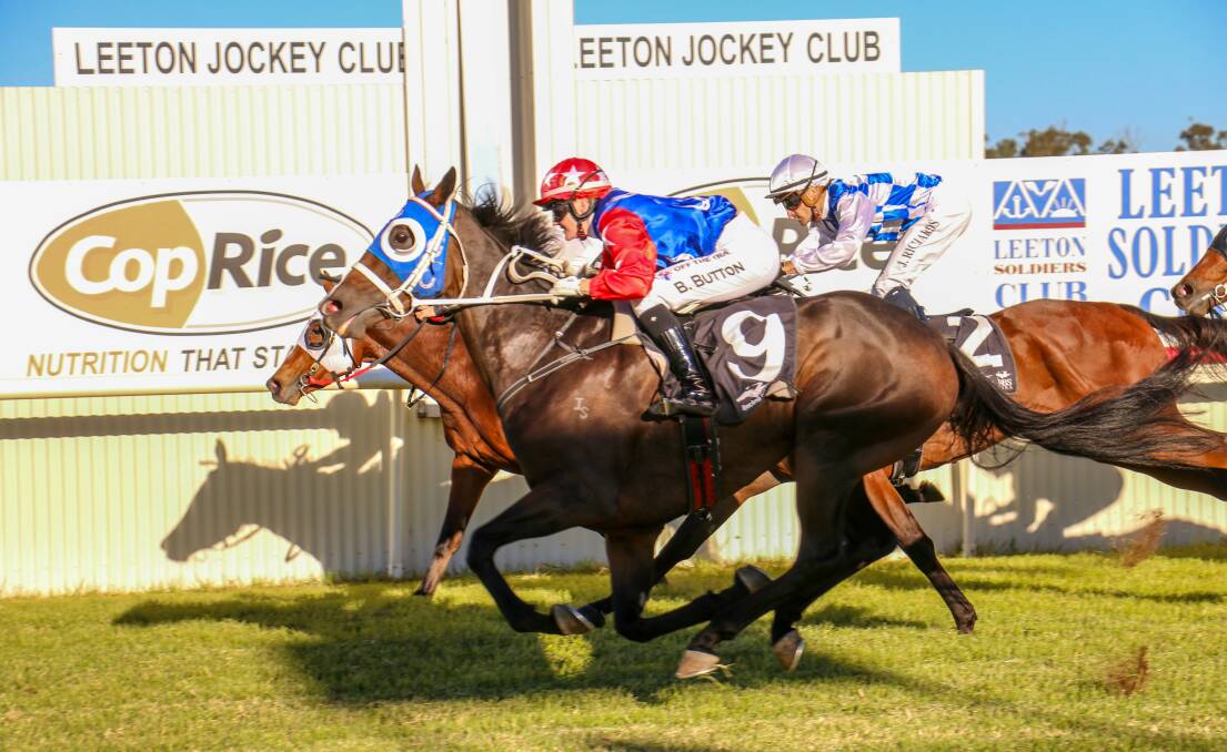 Brittany Button storms down the outside on Jayzeal to win the Leeton Cup for Wangaratta trainer Chris Davis. Picture by Kim Woods