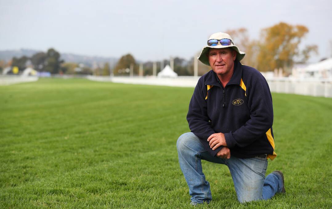 MAN OF THE MOMENT: Murrumbidgee Turf Club track manager Mark Hart looks over the turf that held up brilliantly over the Gold Cup carnival. Picture: Emma Hillier