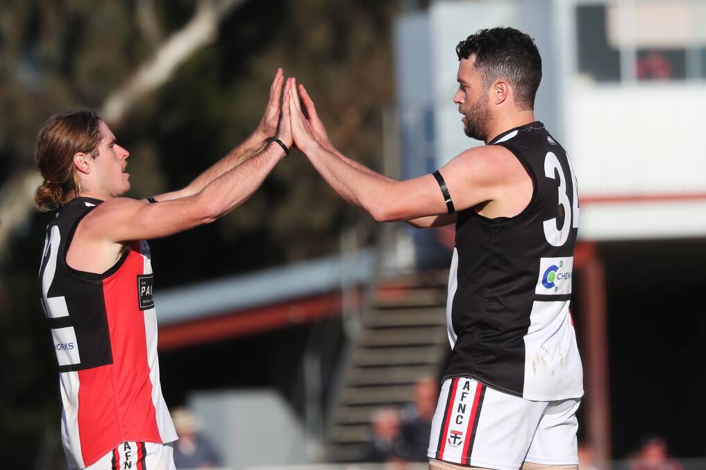 BIG OUT: Corey Watt (left) is out of North Wagga's preliminary final team due to a hamstring injury, while James Morris (right) is named at centre-half-forward for the Saints.