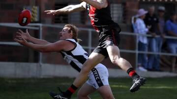 IN TROUBLE: The Rock-Yerong Creek's Harri White looks to mark against Marrar's Zac Lewis earlier in the season. White will miss Saturday's qualifying final due to suspension. Picture: Les Smith