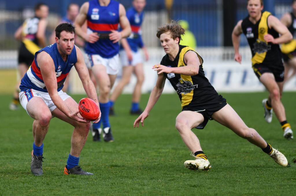 UPSET: Turvey Park's Mat Bailey gets his hand on the football first in the surprise win over Wagga Tigers at Robertson Oval on Saturday.